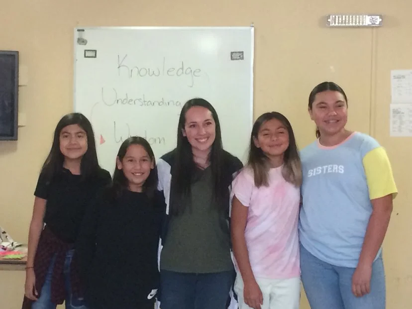 Group of students posing with Olivia