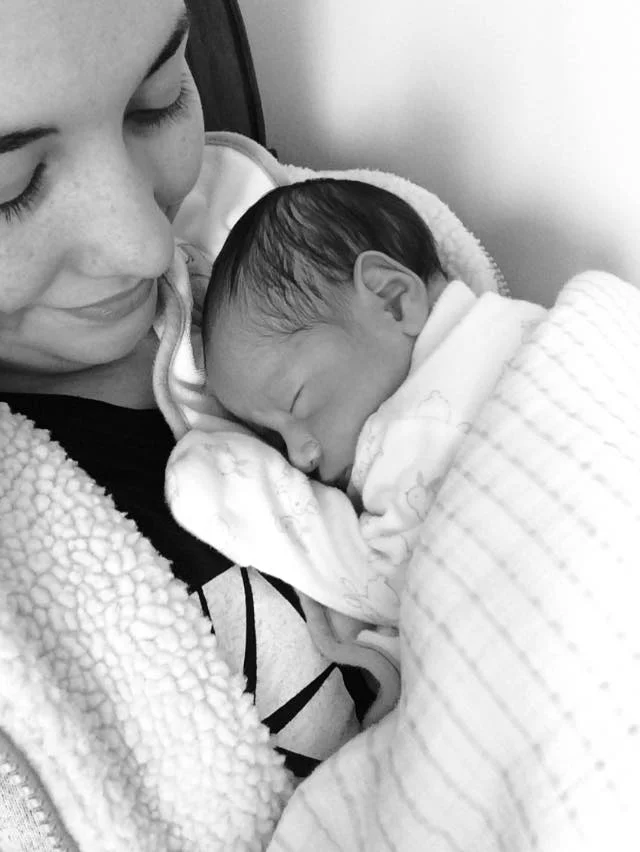 Olivia holding baby B&W